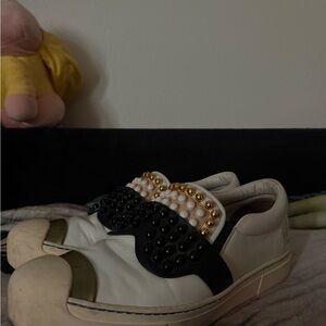 Stylish Fendi Sneakers with Gold and Black Accents